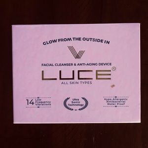 New in box! Luce facial cleaner/ anti-aging device